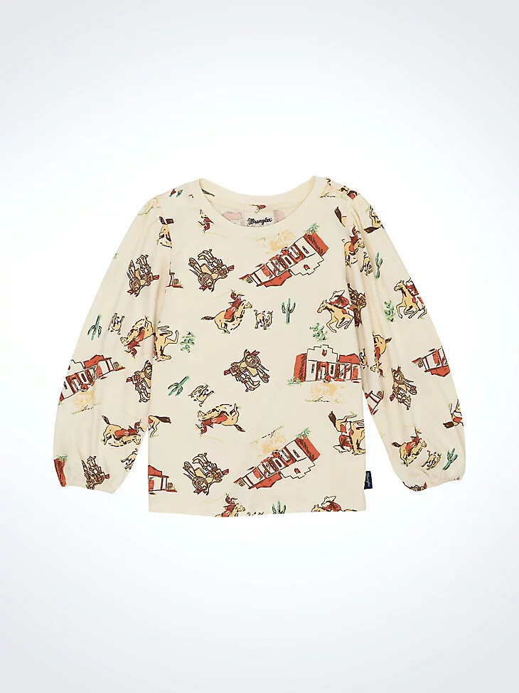 camiseta blanca con estampado western y mangas de obispo para niña