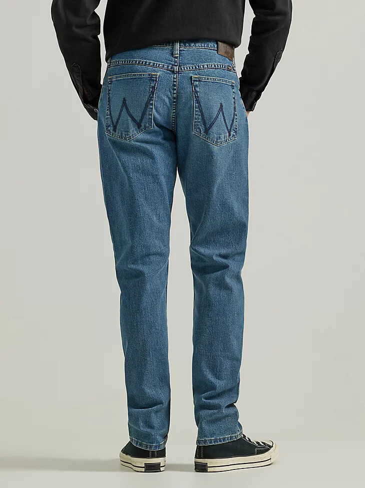 vaqueros de corte bota holgados para hombre lavado medio
