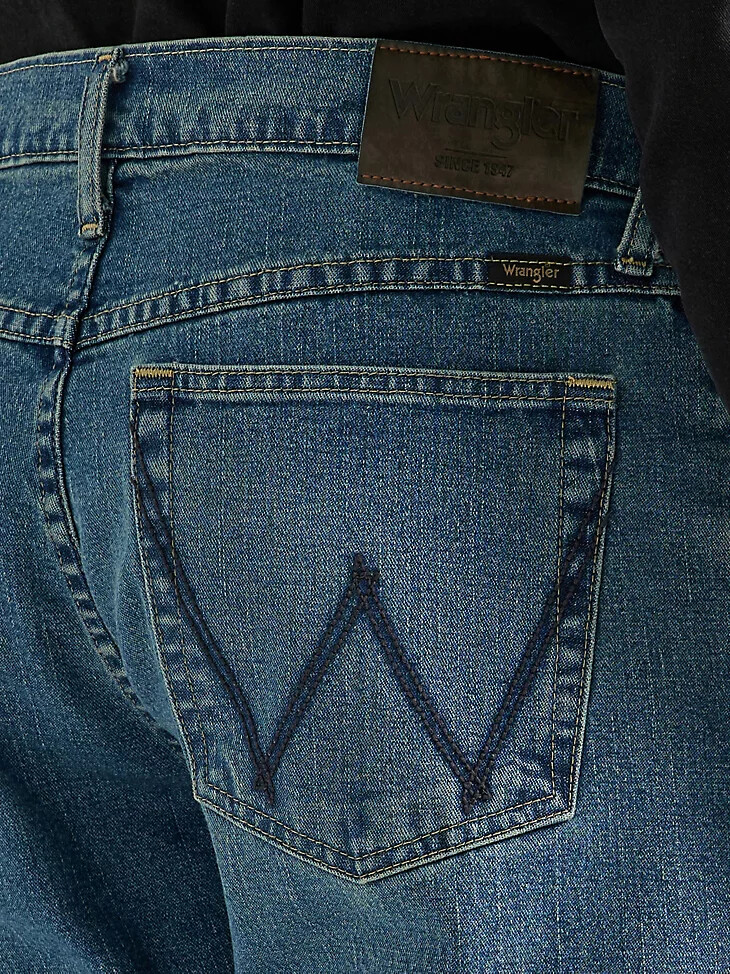 vaqueros de corte bota holgados para hombre lavado medio