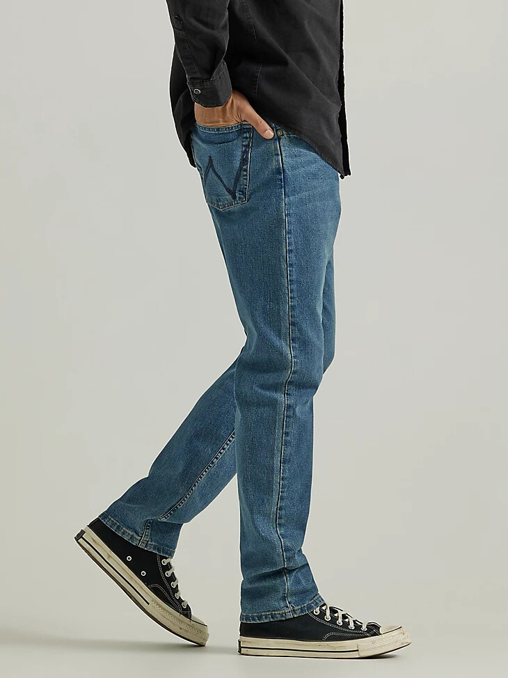 vaqueros de corte bota holgados para hombre lavado medio