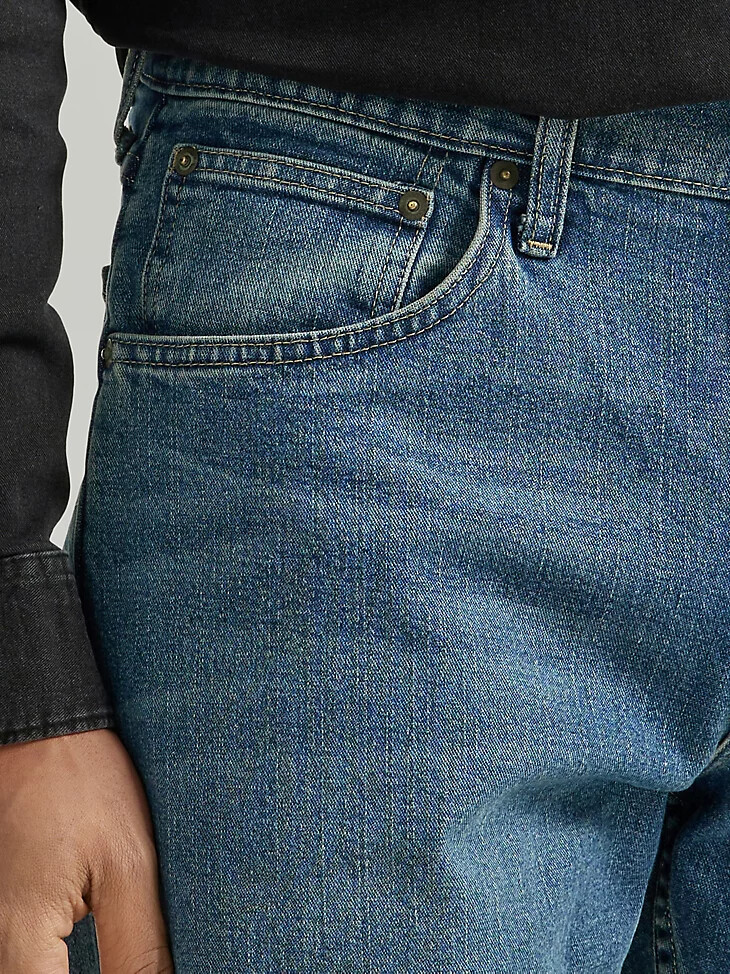 vaqueros de corte bota holgados para hombre lavado medio