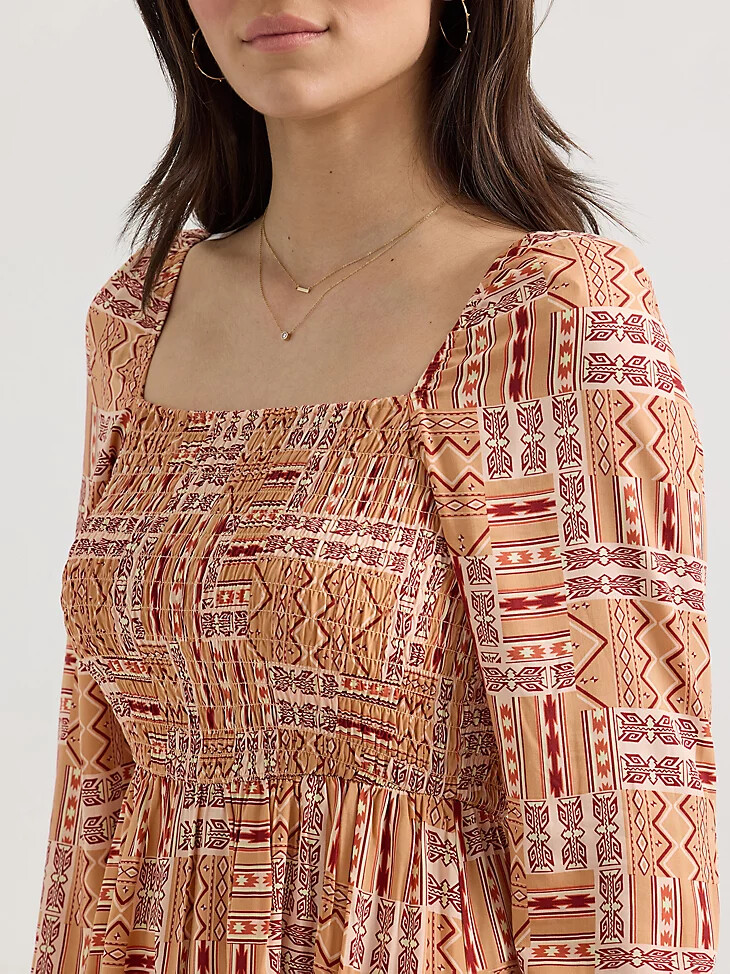 vestido de mujer con escote fruncido corte a color naranja geométrico