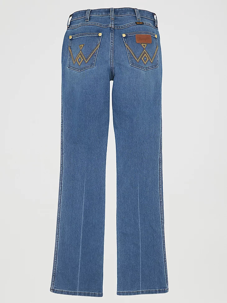 wrangler x yellow rose by kendra scott jeans de corte bota con lavado medio